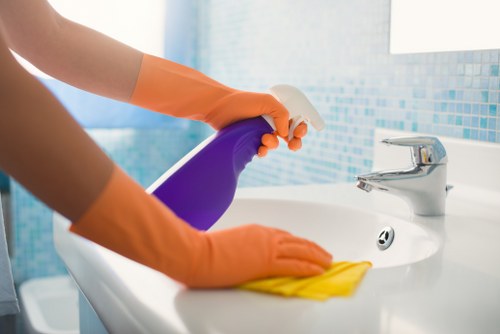 Cleaner in Islington supporting office cleanliness and order